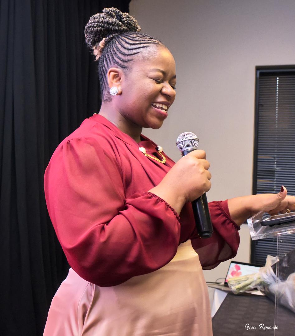 Sister K leading prayer at the Empowerment in Action Awards 2026