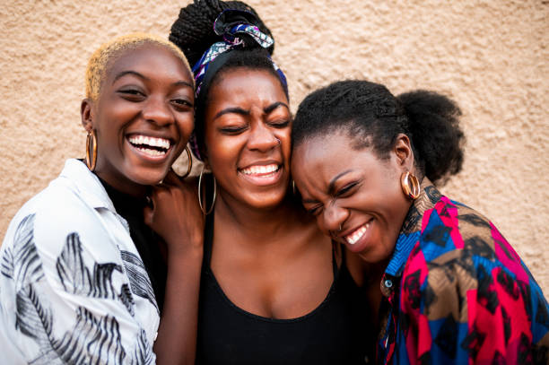Three beautiful women laughing